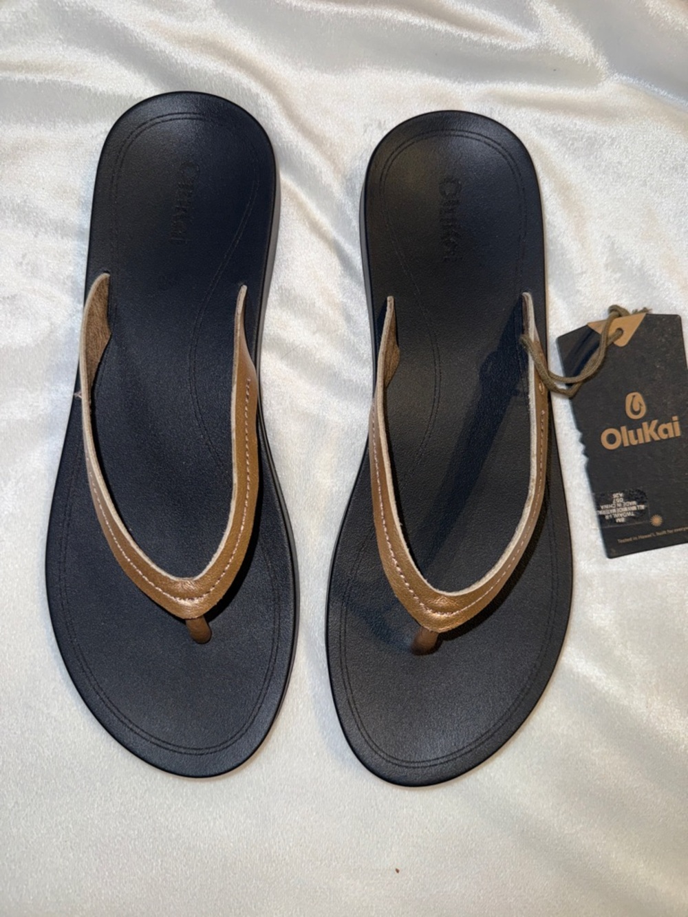 OluKai Women’s Black Footbed Gold Strap Sandals
